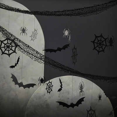 HALLOWEEN BACKDROP WITH HANGING SPIDERS, BATS AND COBWEBS